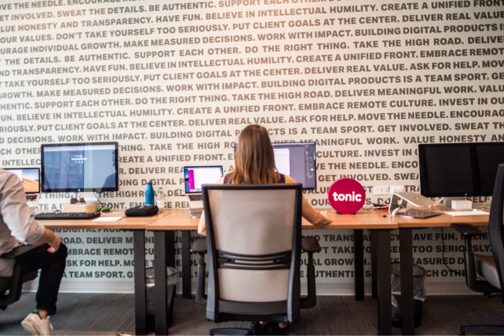 Picture of Sarah working in the Tonic office
